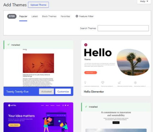 WordPress Add Themes screen showing 8709 themes with Popular, Latest, Block Themes and Favorites tabs and an Upload Theme button